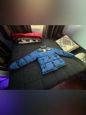 The North Face Blue and Black Puffer Jacket